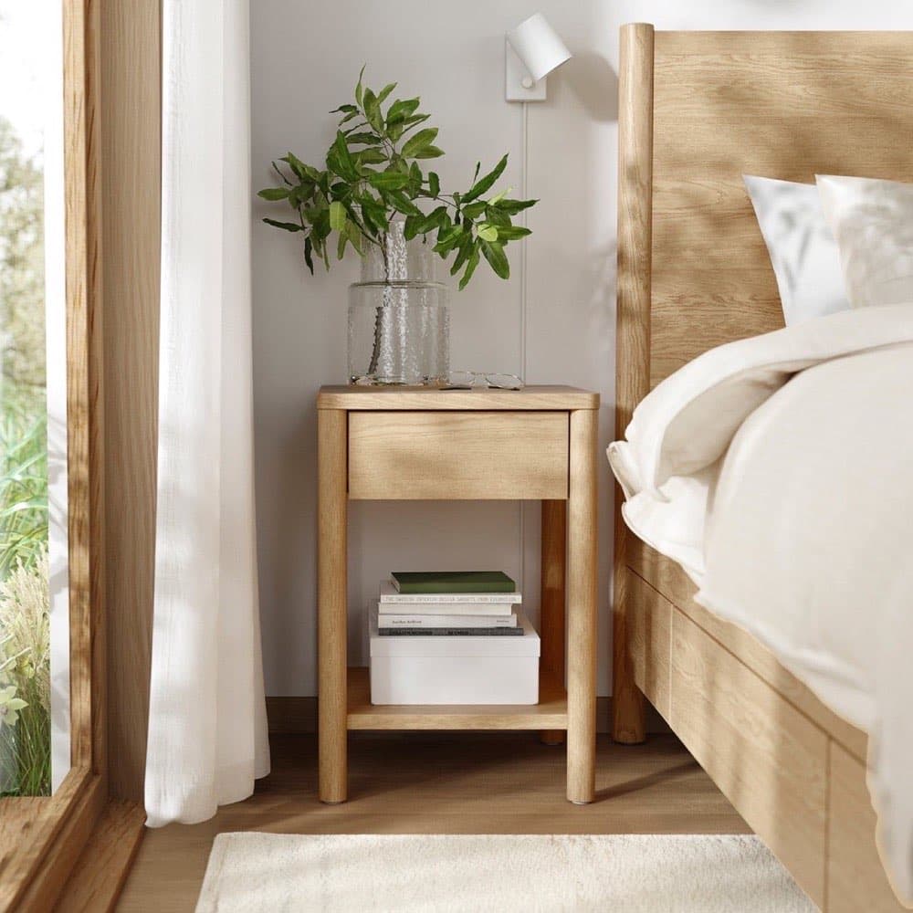 A bedroom furnished with the Solid Oak Bed Frame