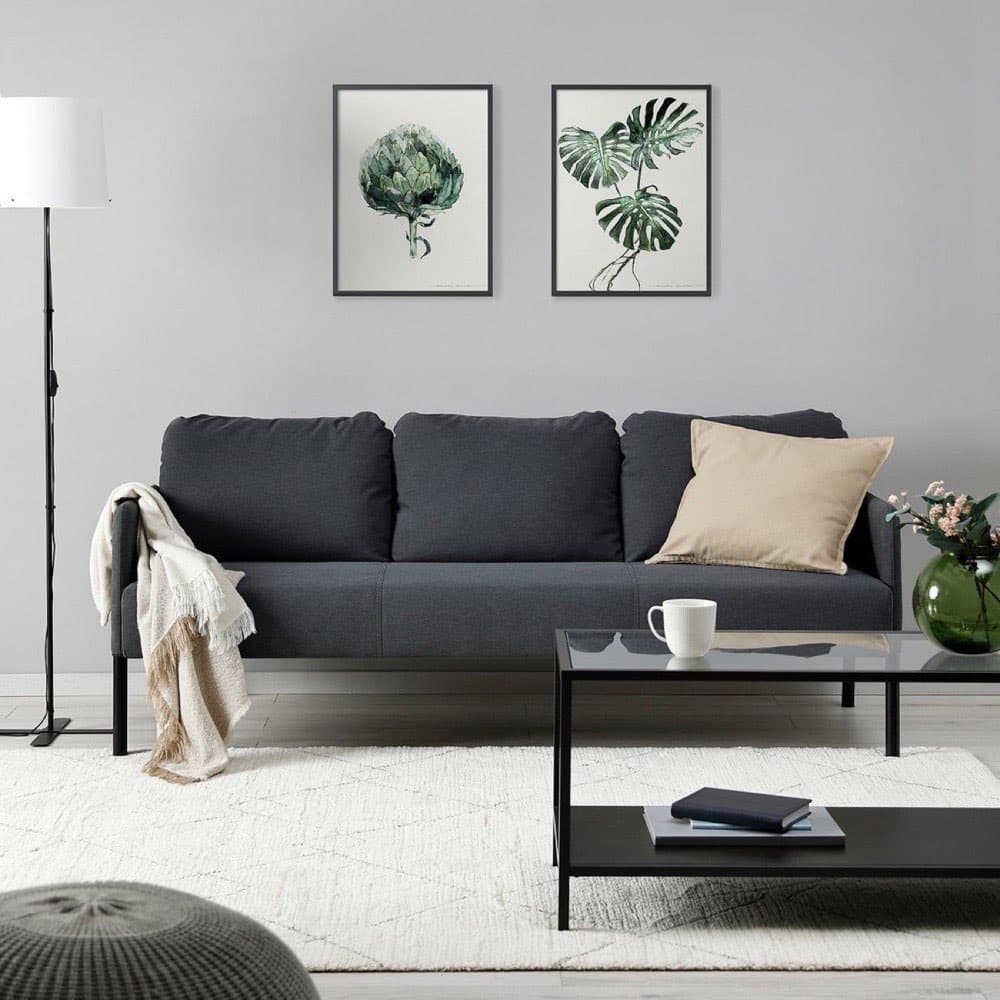 A living room furnished with the Linen Three-Seat Sofa and oak coffee table